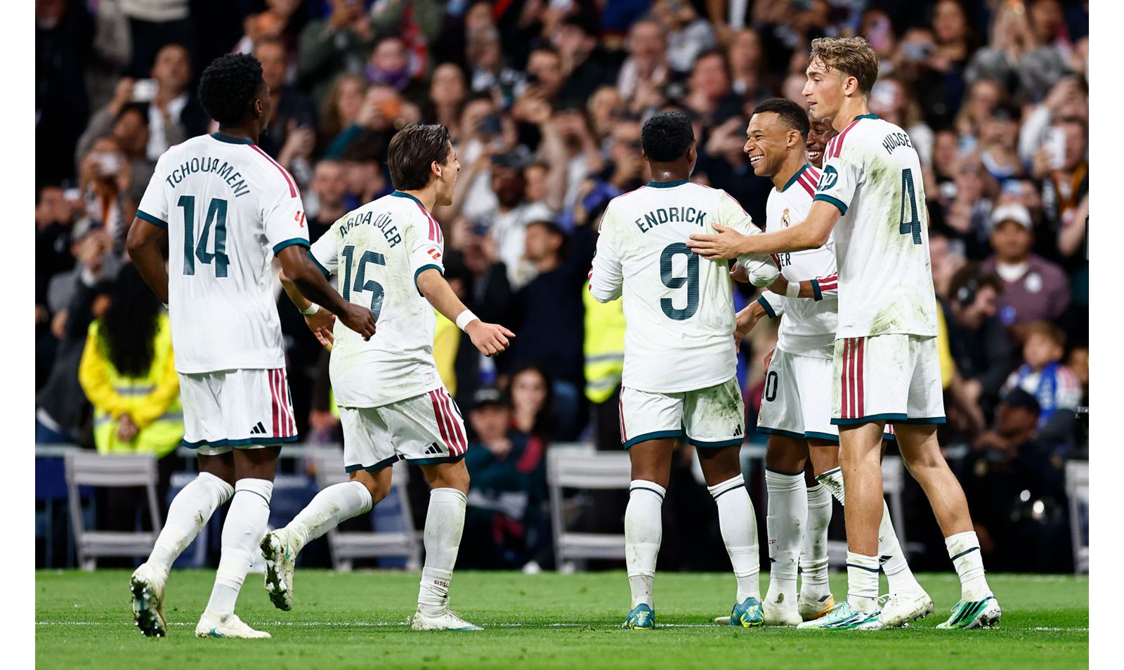 Real Madrid players including Jude Bellingham and Endrick celebrate against Sevilla in October 2026