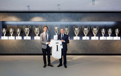 firma del acuerdo de colaboración entre el real madrid y bmw españa