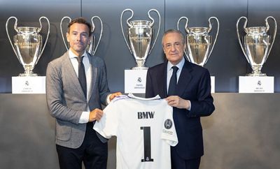 firma del acuerdo de colaboración entre el real madrid y bmw españa