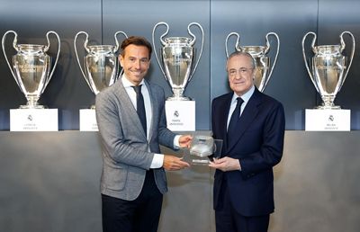 firma del acuerdo de colaboración entre el real madrid y bmw españa