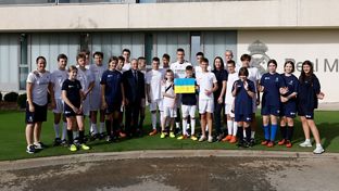 Encuentro del presidente y Lunin con un grupo de niños ucranianos