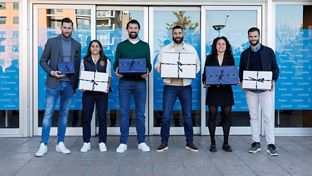 Real Madrid coaches and players pay a visit to children in hospital