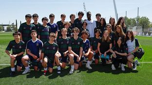 Camavinga greets participants of a Real Madrid Foundation education clinic