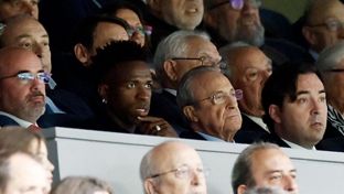 Vini Jr. watches the match alongside the president from the Santiago Bernabéu box