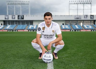 Brahim poses in the Real Madrid jersey