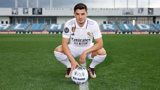 Brahim poses in the Real Madrid jersey