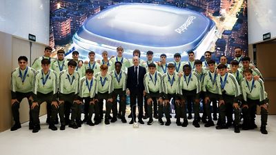 The president, with the Youth League winners at the Bernabéu